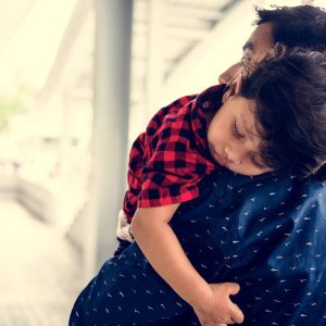 father and son hugging eachother after paternity testing and child custody issues.