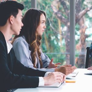 couple discussing with divorce lawyer about marital property
