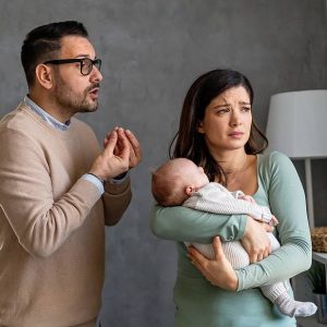 husband talking with wife - concept of paternity right